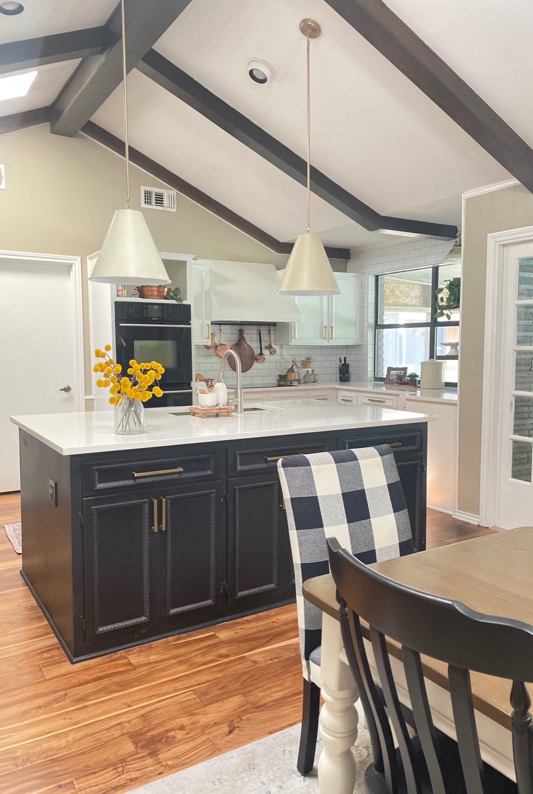 Breakfast nook with bench seating and black windows
