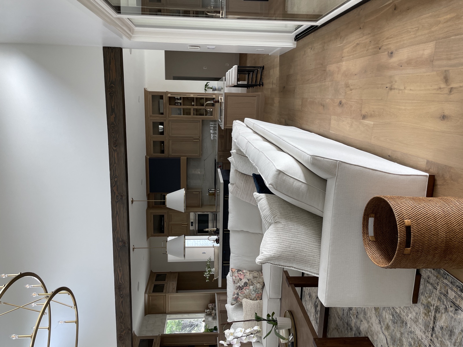 Open-plan living room looking into the kitchen